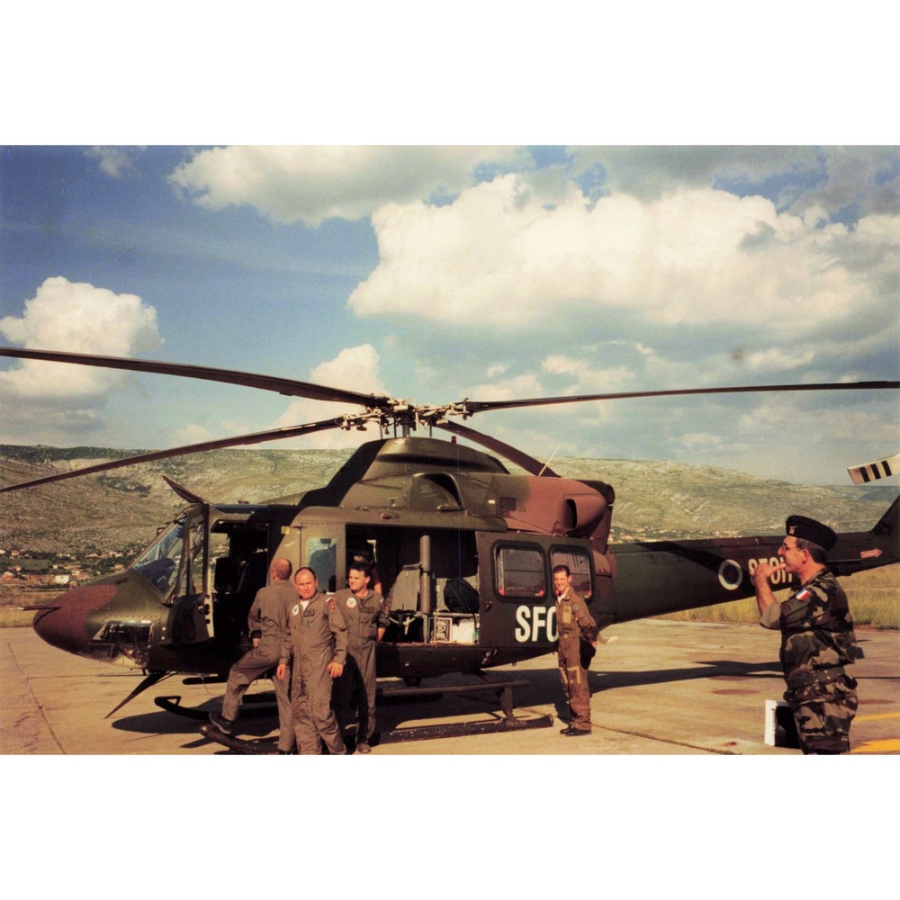 Vintage 1999 SFOR Bosnia UH-1N Helicopter Airfield Photo Lot 6x4 - Picture 1 of 5